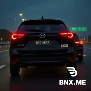 Photorealistic rearview mirror view, cinematic shot from behind driving on a dark Malaysian North-South Highway (PLUS) at night. In focus: Mazda CX-5 facelift 2025 2.5 2WD, Black with blacked-out trim, rear tail lights glowing bright red. License plate 'BSQ 6882' clear and visible. A second car behind it: BYD Sealion 7 Performance 2026, Cosmos Black color, an electric SUV EV car. Its license plate is the official Malaysia EV "white plate with black text" and the mandatory "ZEV" green logo, reading 'ALN 9114'. Scene details: Two cars cruising together, wet tarmac reflecting their tail lights, glowing street lamps, highway sign in the distance. Style: ultra-realistic, high detail, 8K, atmospheric.